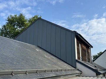 Réalisation d'un bardage gris souris sur la commune de Teillé