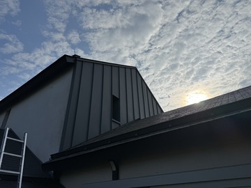 Réalisation d'un bardage gris souris sur la commune de Teillé